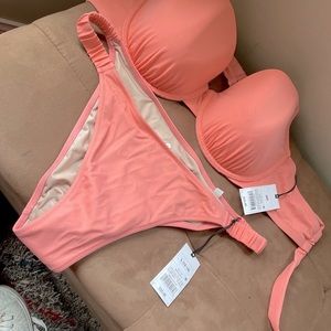 Two piece, shade and shore, bathing suit in the color, coral
